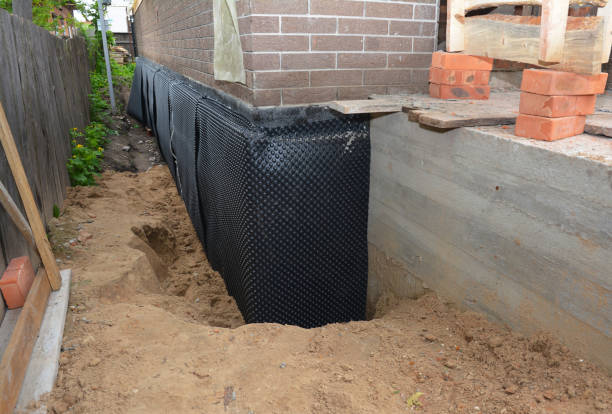 Happy homeowners after waterproofing job in Saukville